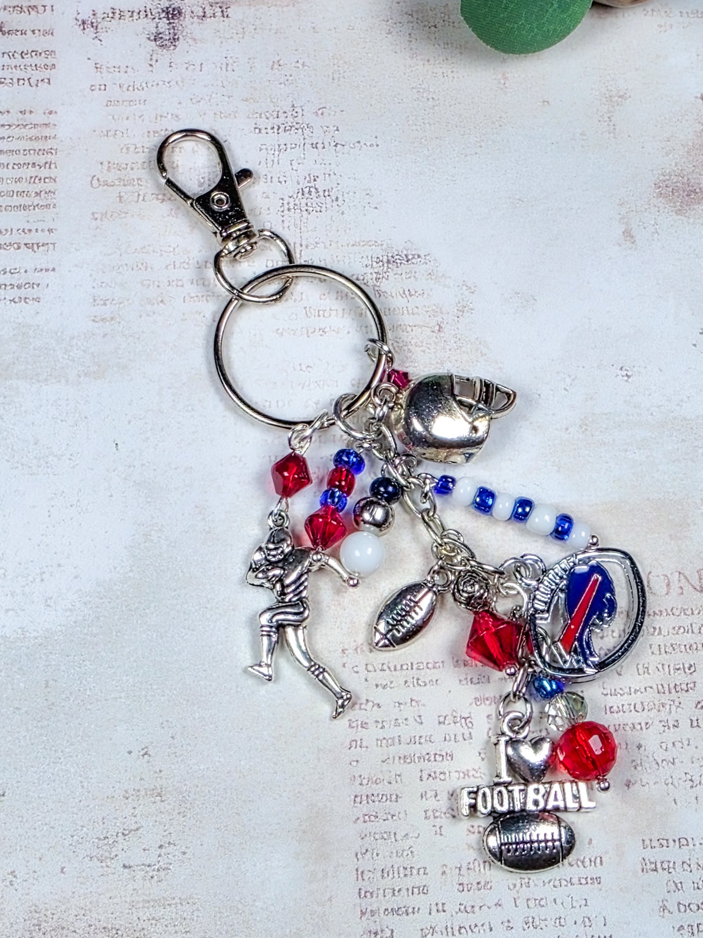 Buffalo Bills football fan keychain bag charm with red white and blue beads and silver football charms