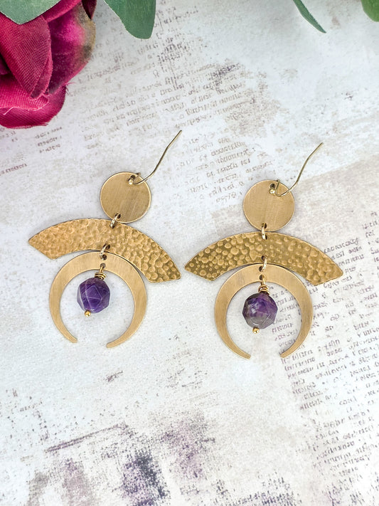 Hammered brass statement earrings with genuine faceted amethyst gemstones and modern geometric brass design.