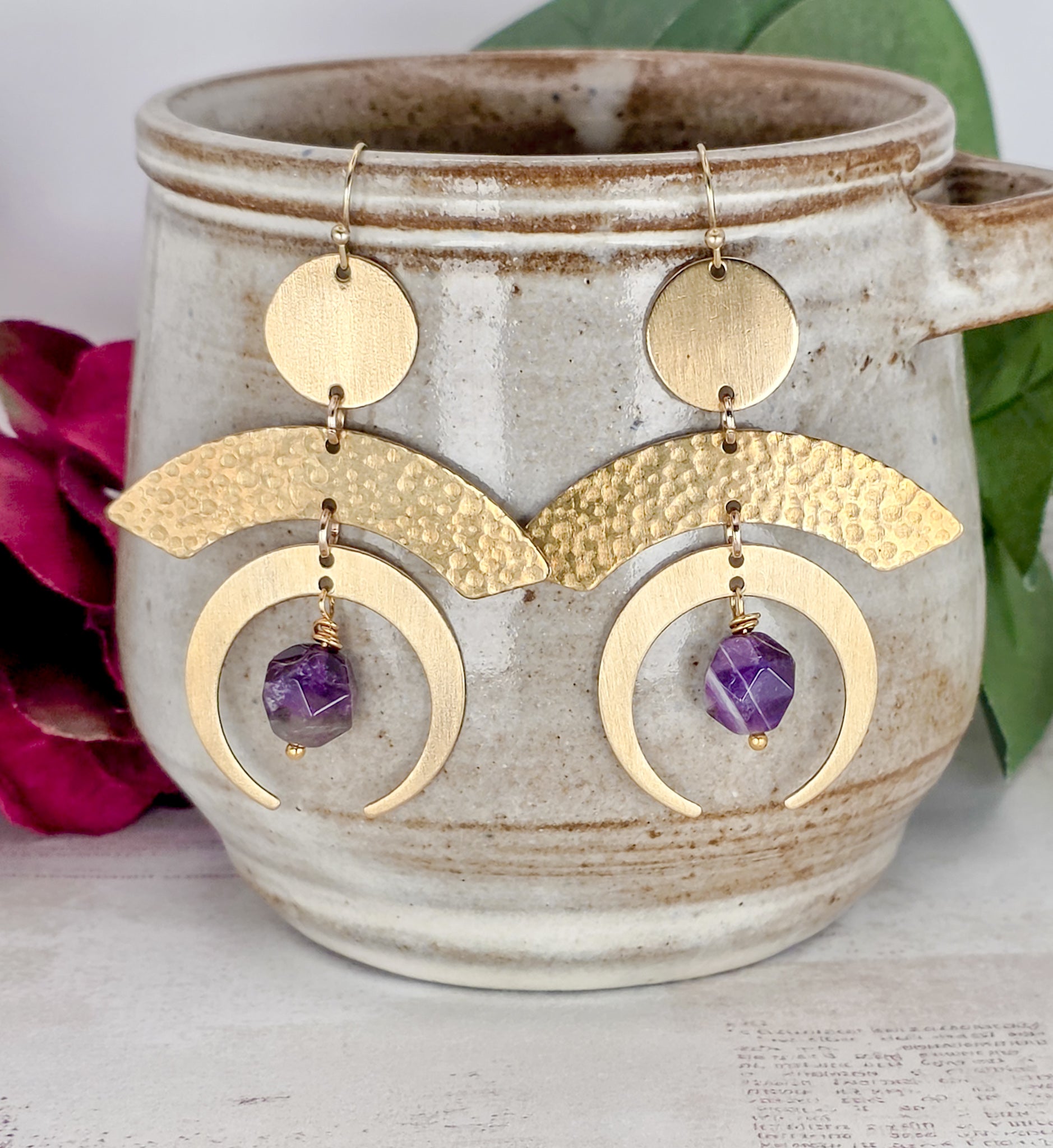 Hammered brass statement earrings with genuine faceted amethyst gemstones and modern geometric brass design.