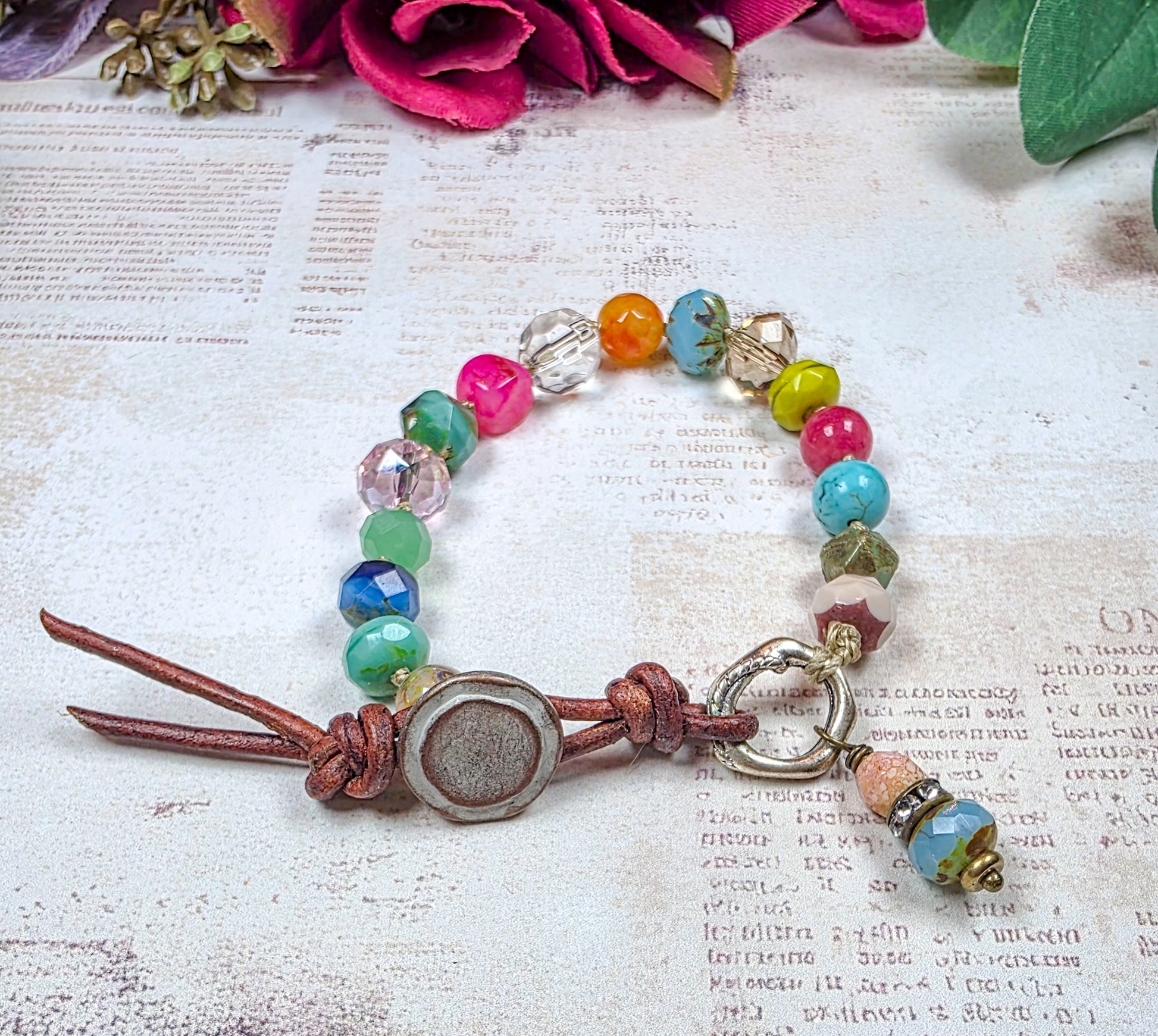 Colorful hand knotted Czech glass bead bracelet with leather button closure