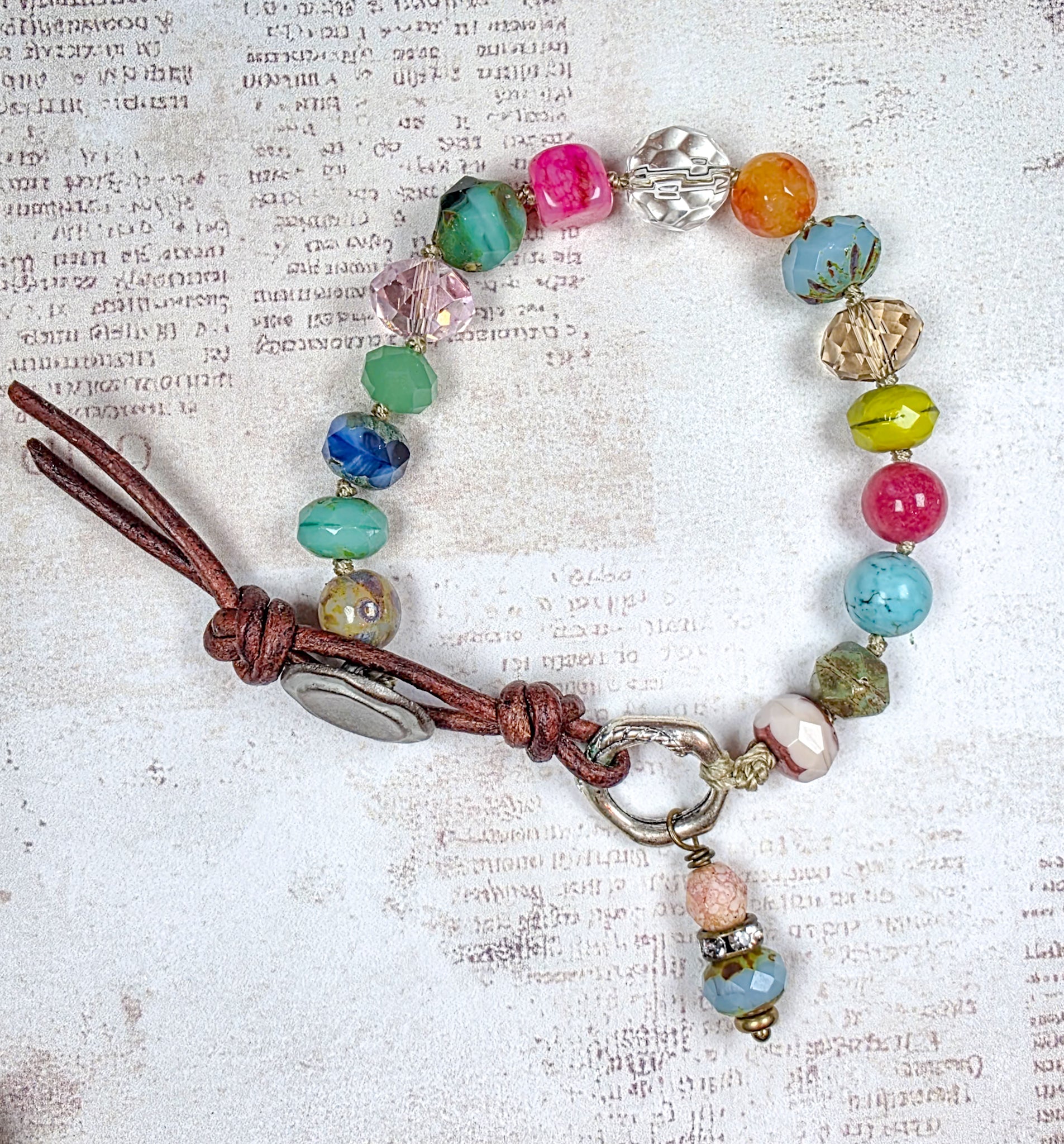 Colorful hand knotted Czech glass bead bracelet with leather button closure