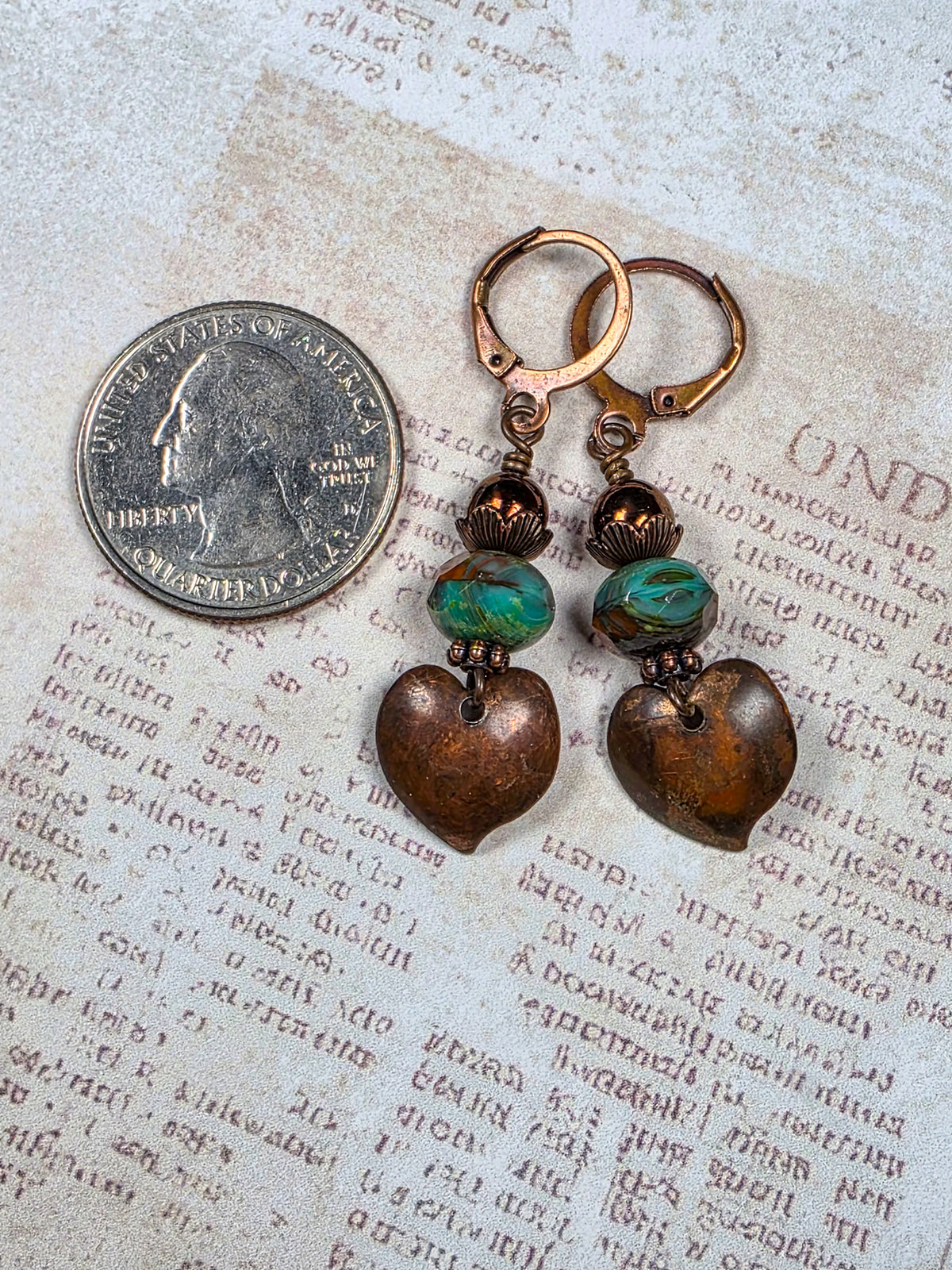 Aged copper heart earrings with turquoise brown Czech glass beads and antiqued copper leverback ear wires