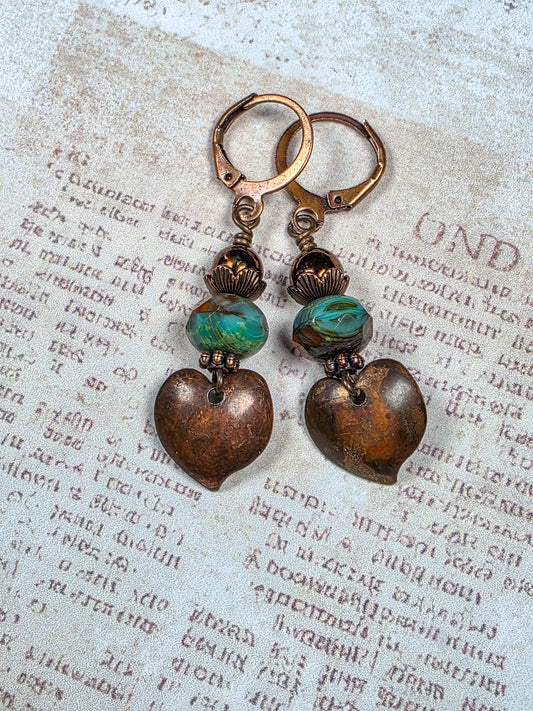 Aged copper heart earrings with turquoise brown Czech glass beads and antiqued copper leverback ear wires