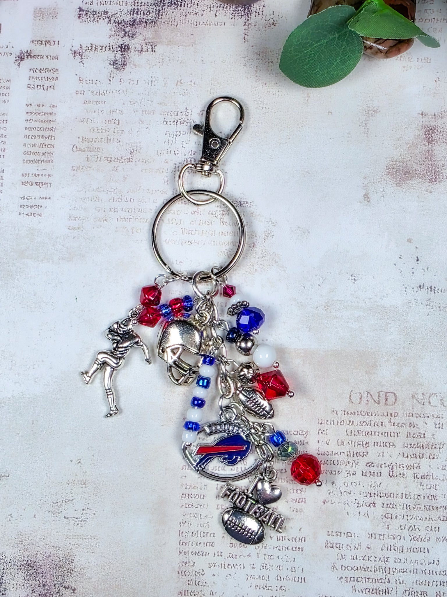 Buffalo Bills football fan keychain bag charm with red white and blue beads and silver football charms