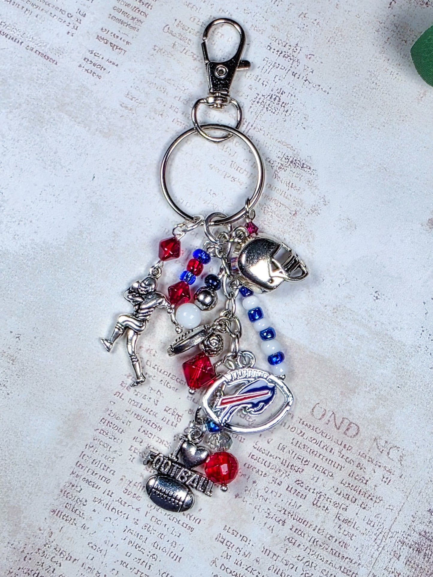 Buffalo Bills football fan keychain bag charm with red white and blue beads and silver football charms