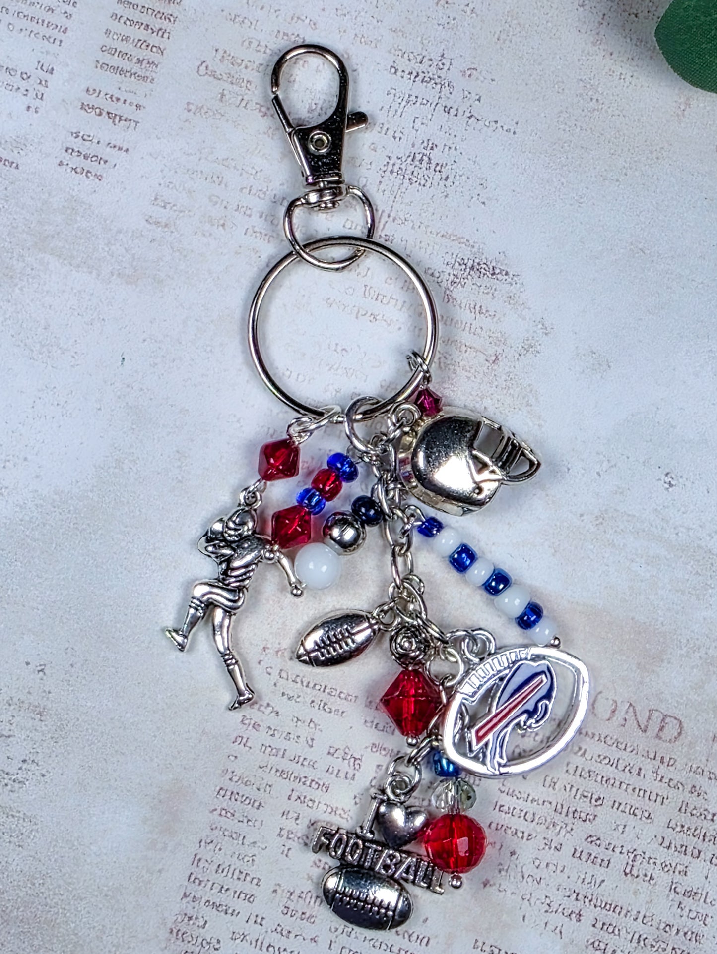 Buffalo Bills football fan keychain bag charm with red white and blue beads and silver football charms
