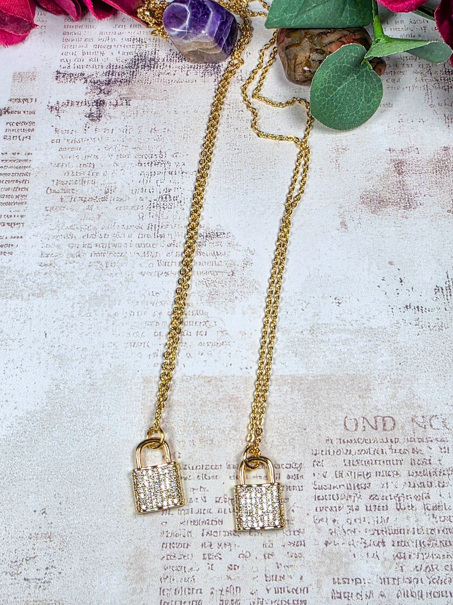 Gold cubic zirconia pavé lock pendant necklace on 16-inch chain