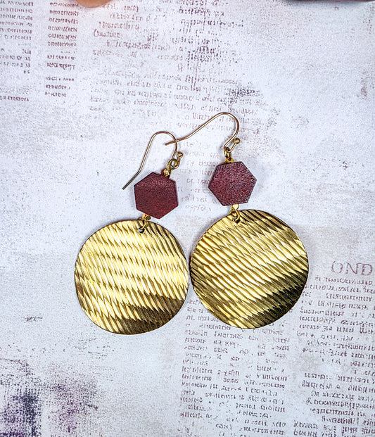 Brass and dark wood geometric dangle earrings with textured round discs