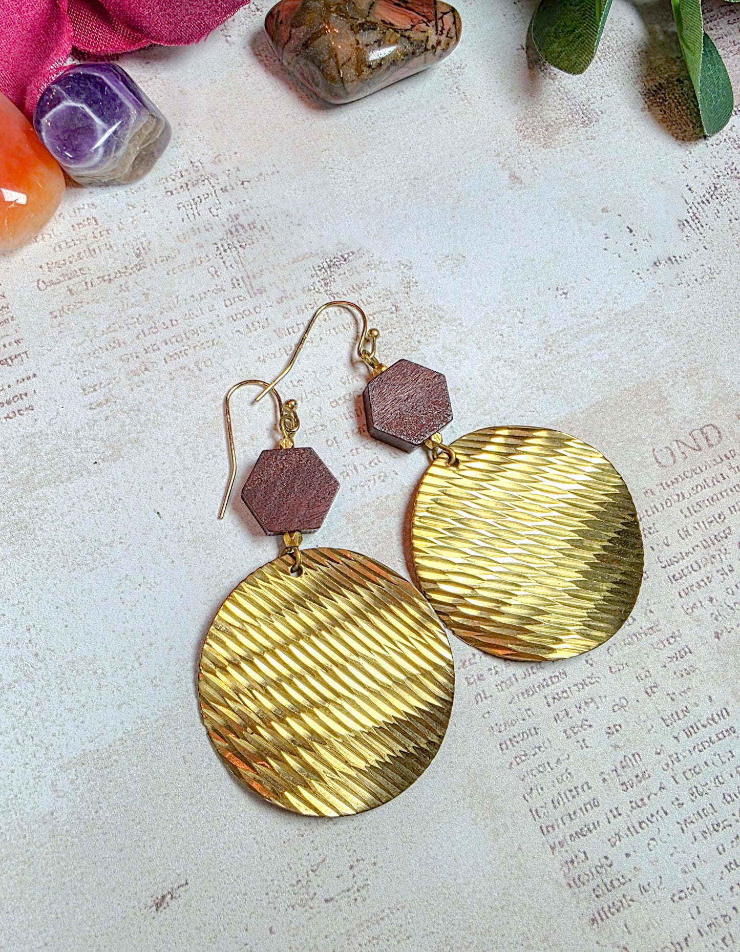 Brass and dark wood geometric dangle earrings with textured round discs