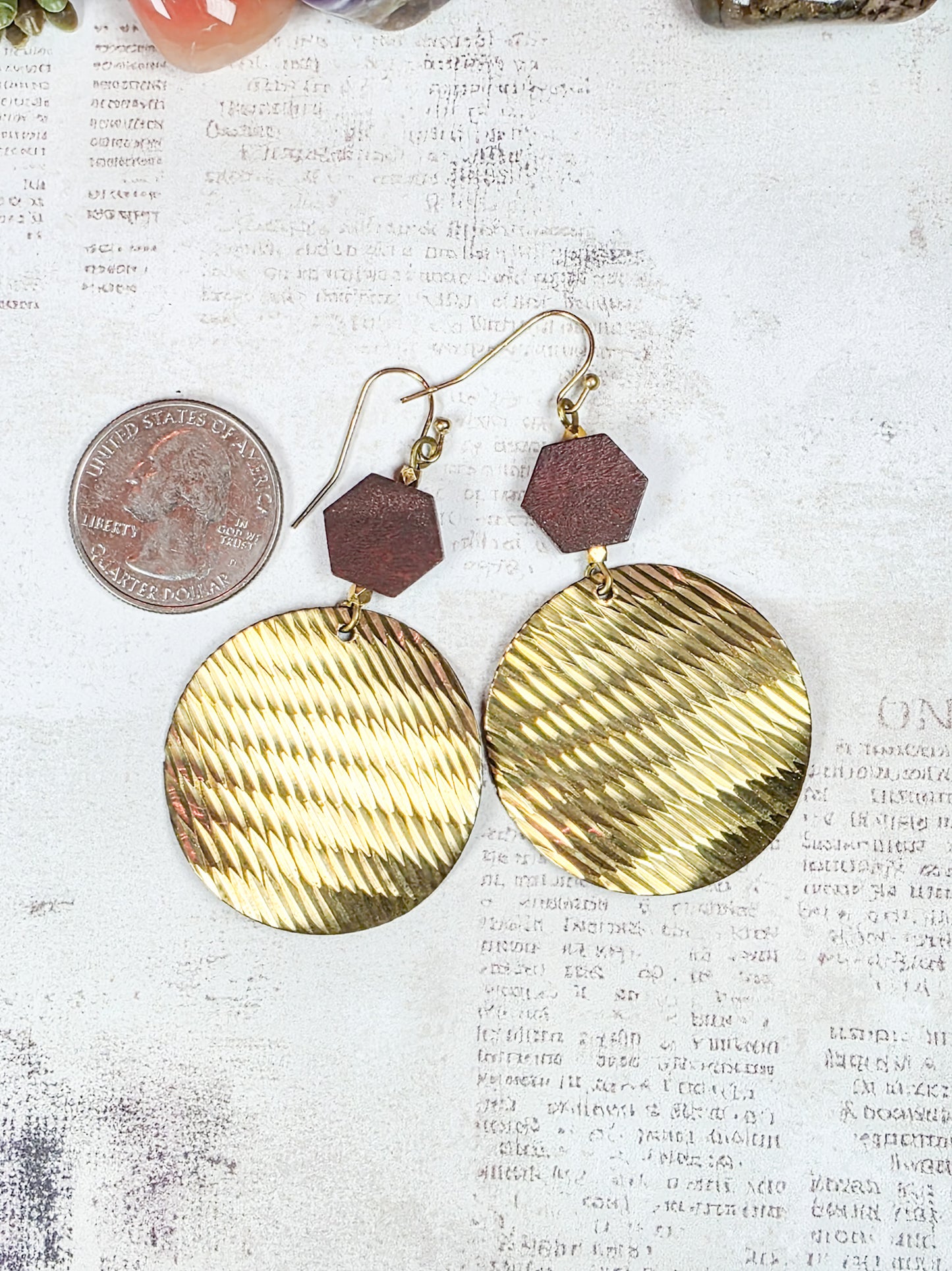 Brass and dark wood geometric dangle earrings with textured round discs
