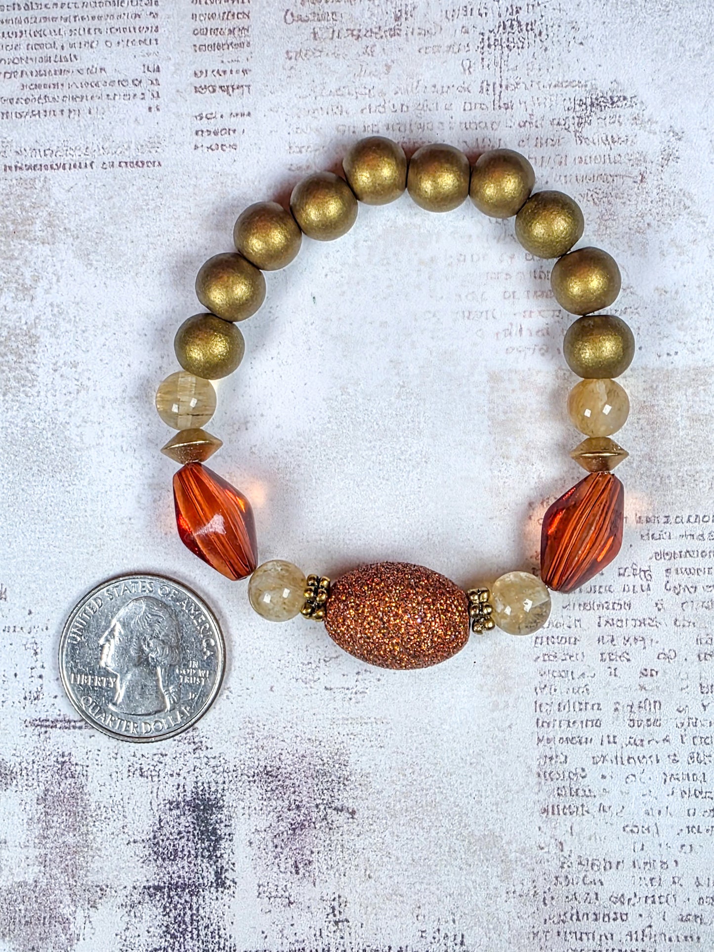 Earthy terracotta beaded stretch bracelet with burnt orange acrylic and bronze-gold wood beads