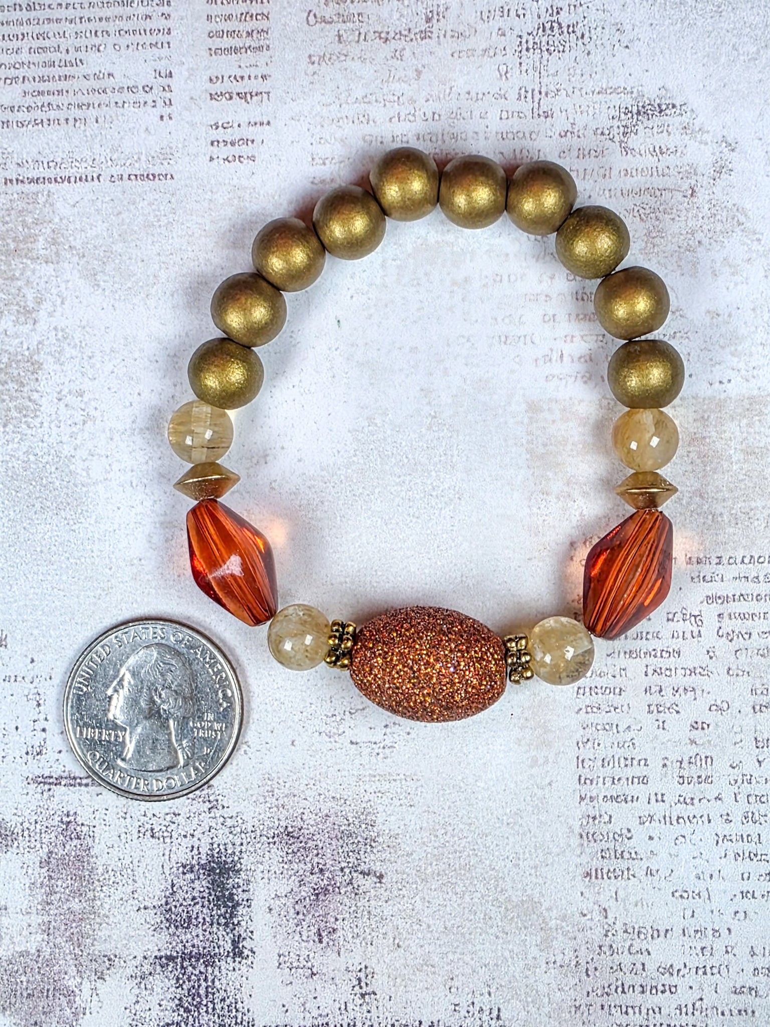 Earthy terracotta beaded stretch bracelet with burnt orange acrylic and bronze-gold wood beads