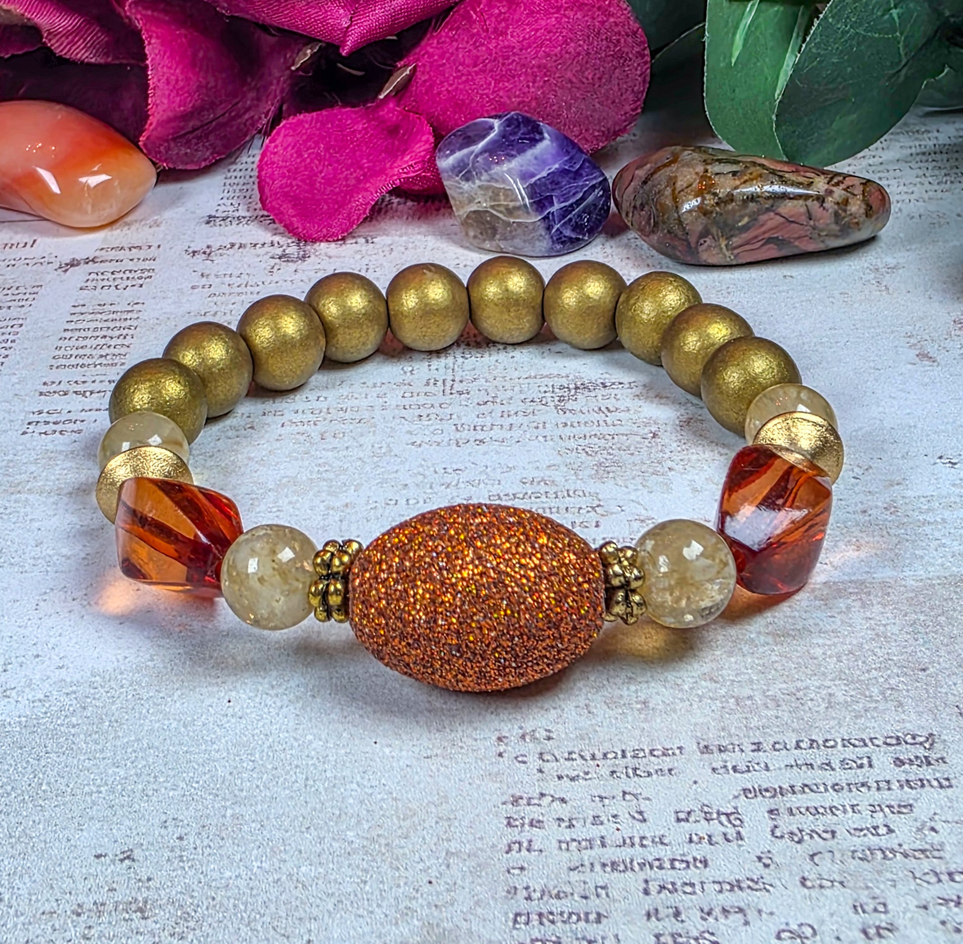 Earthy terracotta beaded stretch bracelet with burnt orange acrylic and bronze-gold wood beads