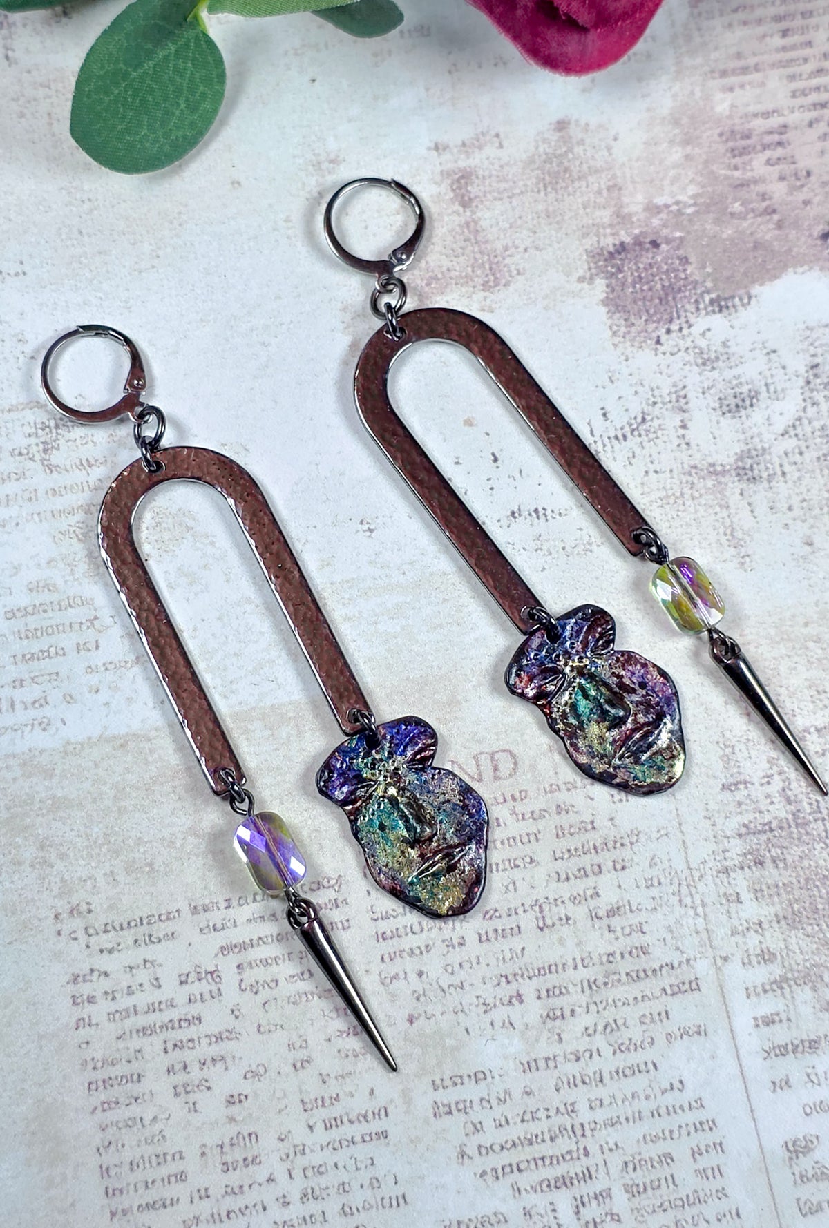 Pewter face dangle statement earrings with hammered metal arches, colorful glass beads and spike charms