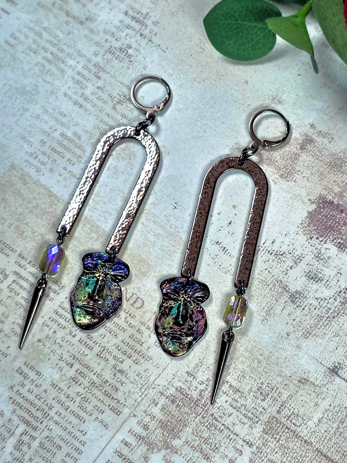 Pewter face dangle statement earrings with hammered metal arches, colorful glass beads and spike charms